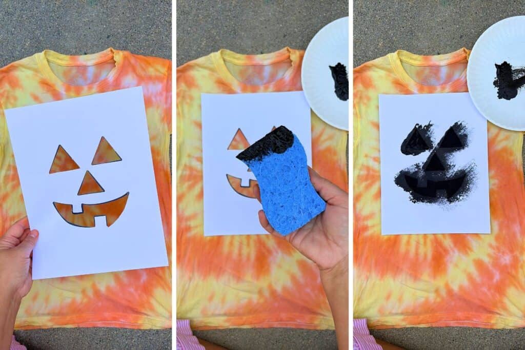 Stenciling the face onto jack-o-lantern Halloween tie-dye shirts with a sponge and black paint, from placing the cut-out stencil to the finished painted face.