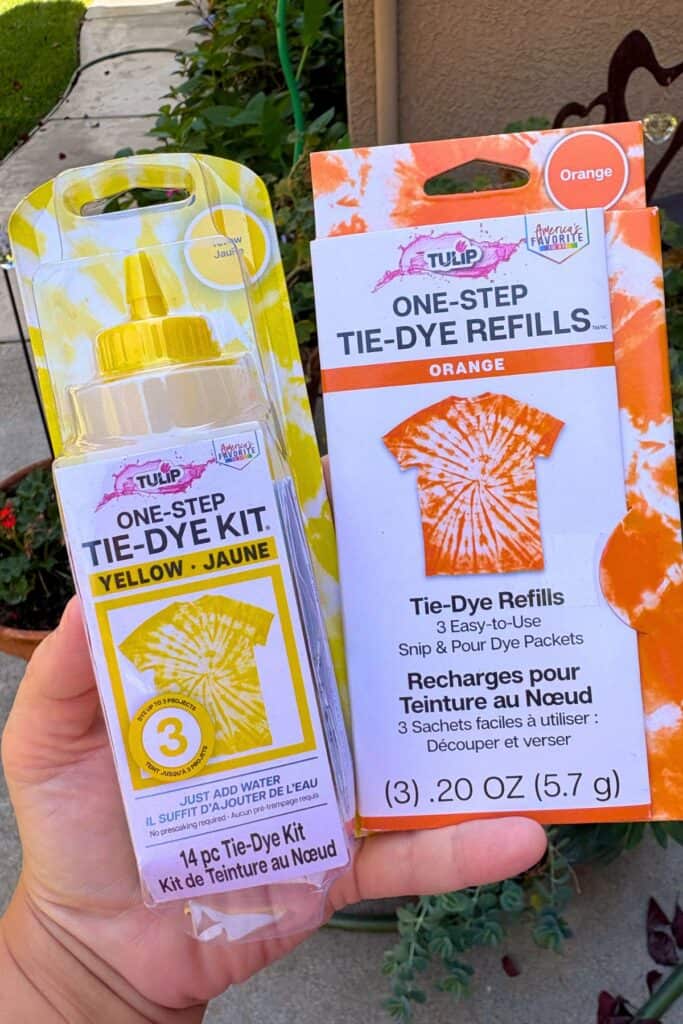 Yellow and orange one-step tie-dye kits, the two colors used to create the pumpkin-swirl base for this project.